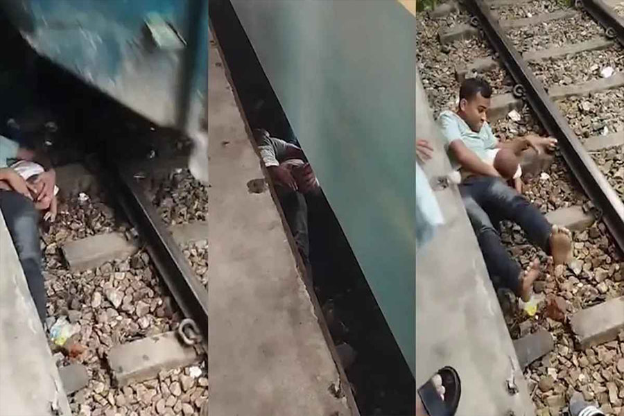 সন্তানকে বাঁচাতে ট্রেনের নিচে লাফ, অলৌকিকভাবে রক্ষা