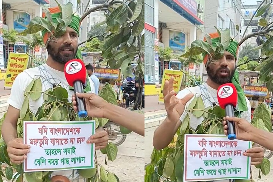 ‘জীবন্ত গাছ’ সেজে ছড়াচ্ছেন সচেতনতার বার্তা